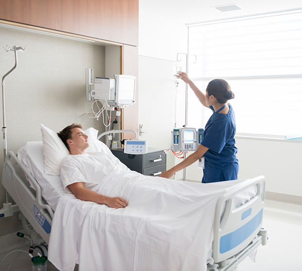 Male patient recovering in hospital bed after cryoablation