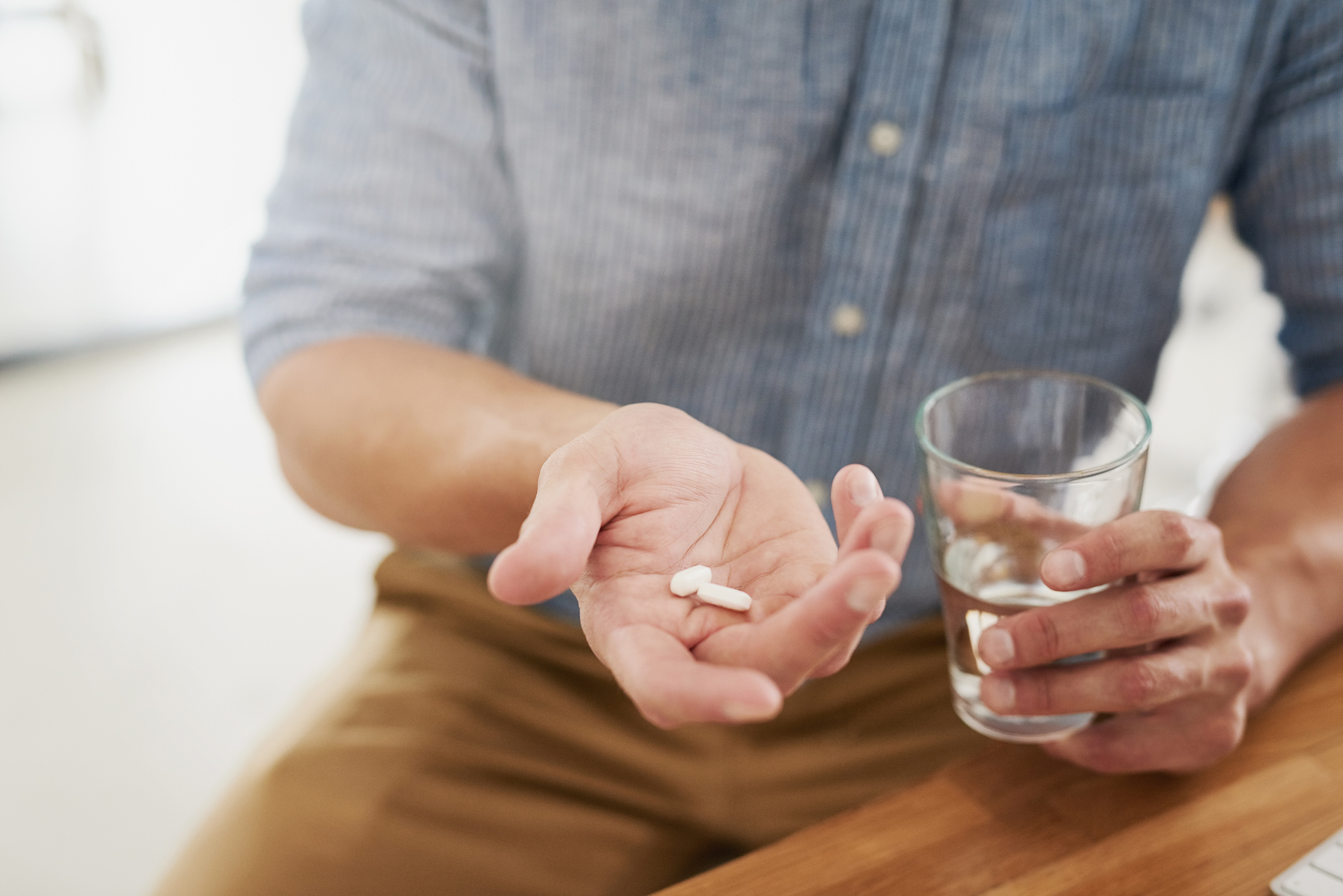 Man taking medication for ejaculatory dysfunction