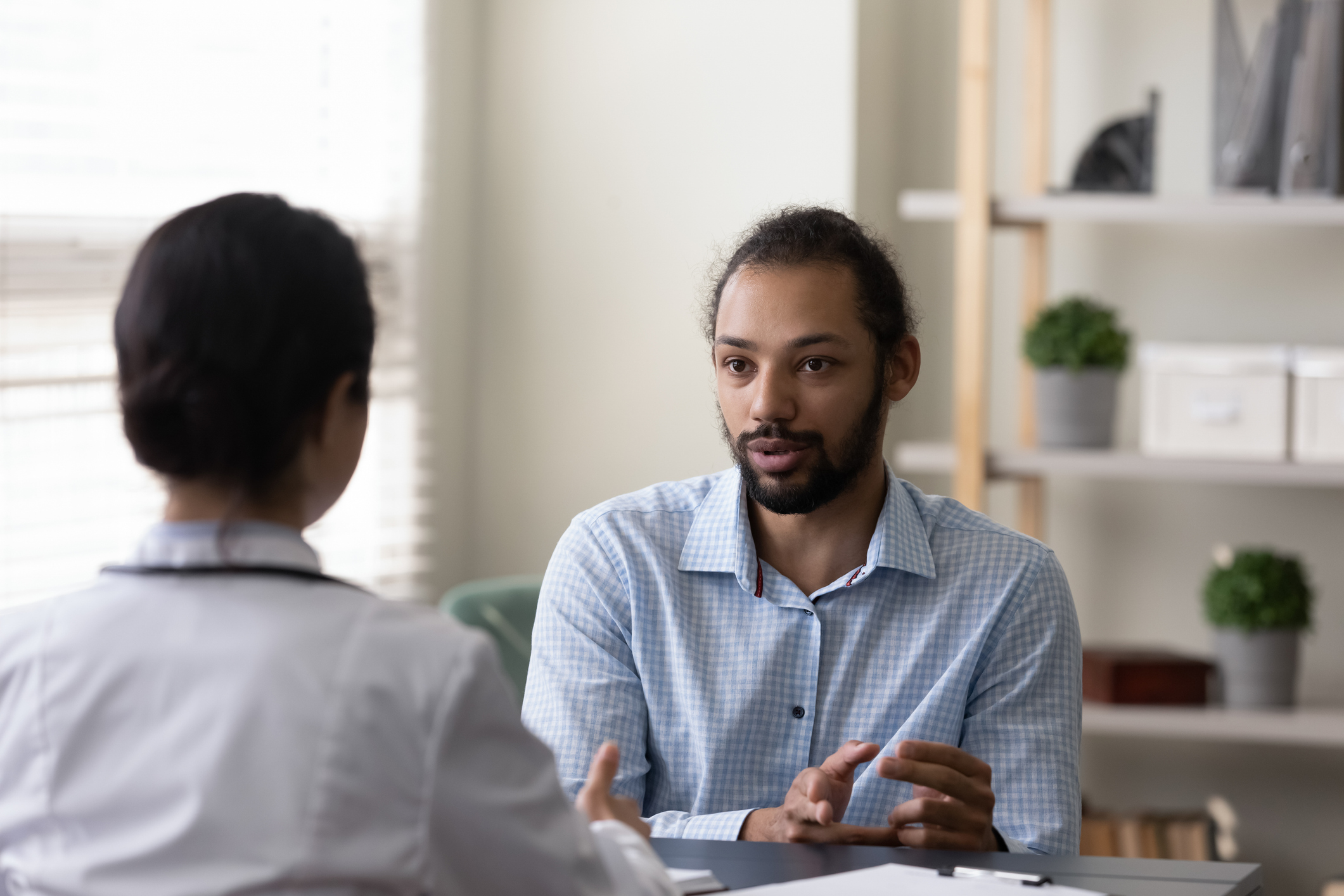 Patient learning about microscopic surgery for varicocele