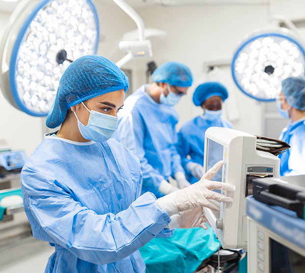 Surgical team performing orchiectomy