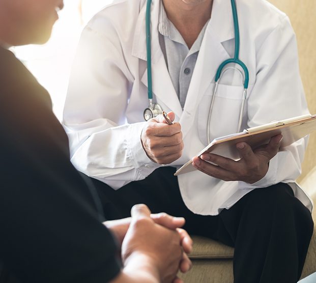 Doctor discussing elevated PSA results