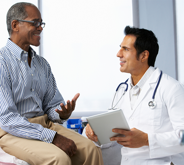 Doctor discussing treatment for phimosis with patient