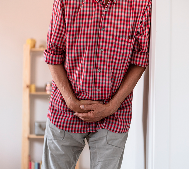 Man experiencing symptoms of elevated PSA