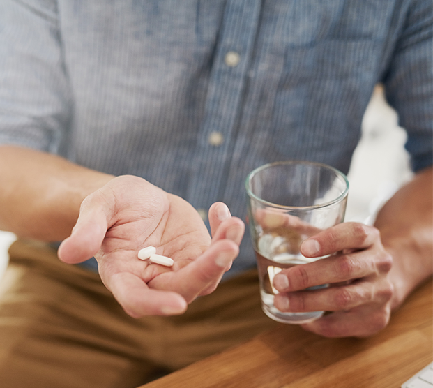 Man taking medication for ejaculatory dysfunction