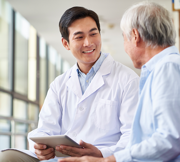 Physician reviewing erectile dysfunction treatment results with patient