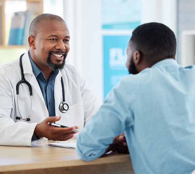 Physician speaking to patient about circumcision